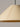 Minimal Spanish pendant light with glare-reducing lower visor in stitched beige parchment
