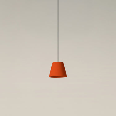 Sísísí Cónicas PT1 pendant lamp by Santa & Cole featuring a handcrafted red-amber ribbon shade