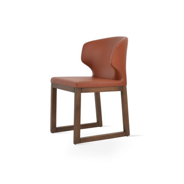 Amed Sled Wood dining chair by Soho Concept with cinnamon PPM leatherette upholstery and walnut beech sled base