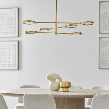Spectica aluminum LED chandelier with adjustable stem mount over dining taable