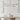 Spectica aluminum LED chandelier with adjustable stem mount over dining taable