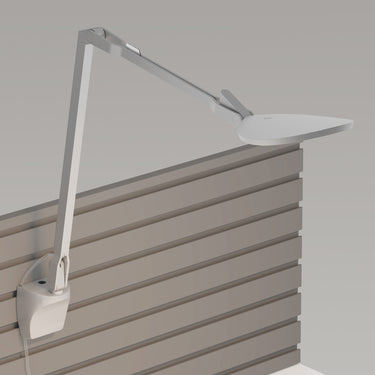 Adjustable LED wall light for reading with swivel head and jointed arm