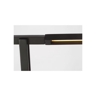 Stagger LED table lamp Nightshade Black finish on bedside table