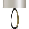 Stella table lamp with an open bronze ring lined in satin brass and a dove grey silk drum shade, studio view