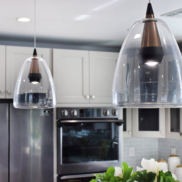 ET2 Sven glass dome pendant over a kitchen counter
