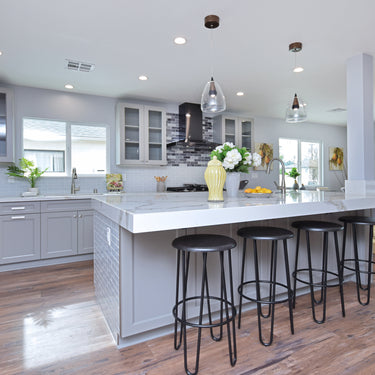 ET2 Sven glass dome pendant over a kitchen island