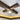 ET2 Swank small clear orb with a chrome band on a ceiling where two dark wood beams cross