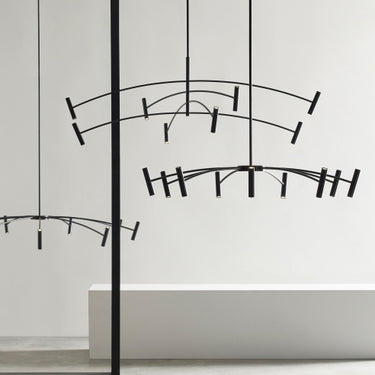 Large contemporary LED chandelier with matte black finish and dual-direction light output
