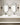 Dark Bronze Banda 24" wall sconce: Contemporary design for bathroom or powder room.
