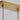 Adjustable hanging height Bau 50 linear pendant light in Natural Brass, perfect for dining rooms and kitchen islands.
