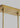 Adjustable hanging height Bau 50 linear pendant light in Natural Brass, perfect for dining rooms and kitchen islands.