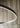 Sleek matte black LED ring pendant fixture from Visual Comfort, mounted on high ceiling
6.