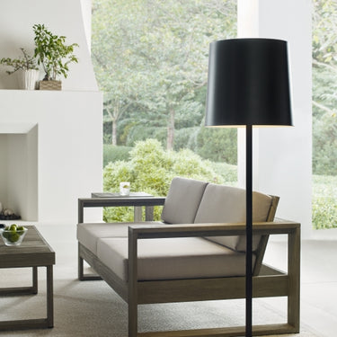 Modern outdoor LED floor lamp with black finish for patios, decks, or garden seating areas