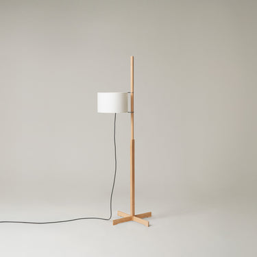 Santa & Cole TMM floor lamp in beech finish with warm ambient lighting for bedroom and reading corner