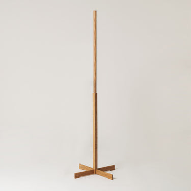 Miguel Milá TMM floor lamp featuring natural beech wood frame and parchment shade for contemporary interiors