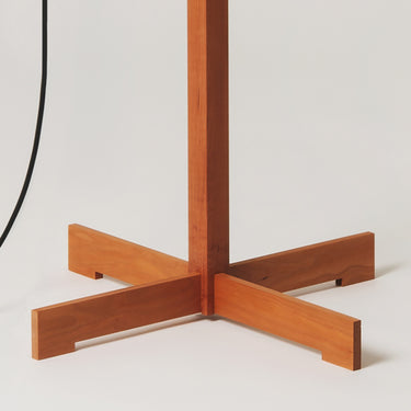 Miguel Milá TMM floor lamp featuring cherry wood frame and parchment shade for contemporary interiors