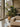 Adjustable parchment shade floor lamp with natural wood frame for contemporary interiors