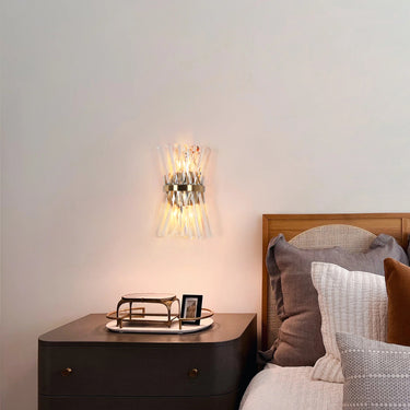 Tadonipkeseismo Sconce Illuminating a Bedrrom
