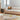 Sirocco wool rug, styled in a room