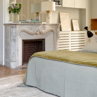 Dotty wool rug in Azur, styled in a room
