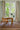 Exclamation wool rug in Bois de Rose, styled in a room