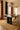 Collage wool rug in Brown, styled in a room