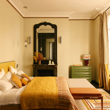Kea wool rug in Multi, styled in a room