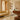Paint wool rug in Ocre, styled in a room