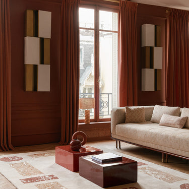 Paladio wool rug in Terracotta, styled in a room