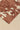 Paladio wool rug in Terracotta, close-up of the pile texture
