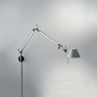 Flexible Tolomeo Mini swing arm wall light in contemporary bedroom task lighting by Artemide