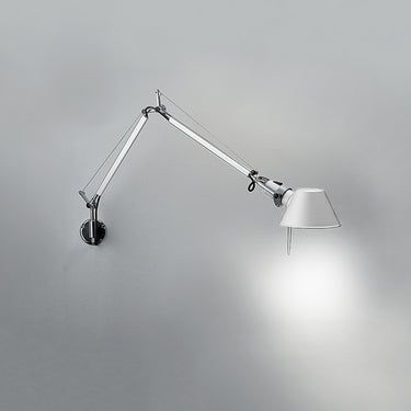 Adjustable Tolomeo Mini wall lamp with pivot swing arm in stylish modern living room lighting design
