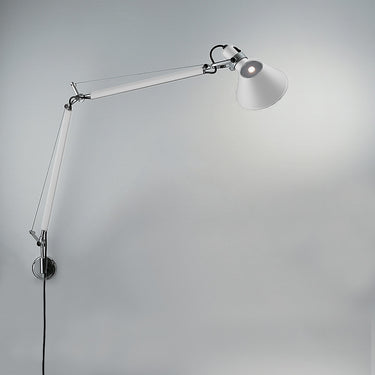Contemporary wall lamp by Artemide with articulated arms and S-bracket mount for home or commercial lighting