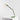 Tolomeo Micro table lamp by Artemide in matte yellow. Adjustable arm and direct task lighting for desks, bedrooms, and workspaces.
