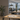 Artemide Tolomeo Midi LED clamp desk lamp in anthracite grey on modern engineering work table with laptop and blueprints