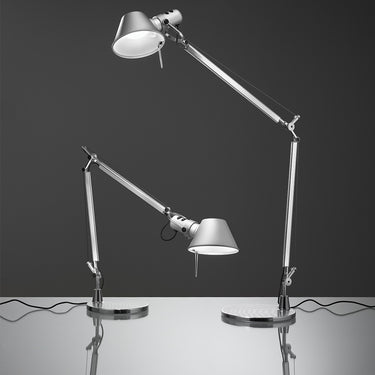 Artemide Tolomeo Mini task lamp with dimmable LED light and tiltable shade in sleek aluminum for bedrooms or hotel rooms