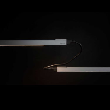 Energy-efficient tunable LED undercabinet fixture with touch strip dimmer
