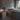 Astep Upglas T2 table lamp, pair of black lamps beside a bed