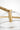 Lowing Medium Chandelier in Polished Antique Brass, second close view of a clear glass globe and its hammered arm