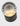 Bronze Mina Accent tilted so the glass globe glows with warm light inside