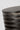 Detail of the Dark Bronze top disc and first rings of the Quoddy Small table lamp