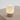 Close view of the Caspe Alabaster 7 lamp glowing with warm light through the alabaster