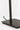 Detail of the Midrand Crystal 19 bronze post meeting the flat bronze base