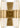 Lassell Double Short Sconce by Sean Lavin in Natural Brass, front view of the lit crystal tubes with natural brass hardware