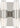 Lassell Double Short Sconce by Sean Lavin in Polished Nickel, front view of the lit crystal tubes with polished nickel hardware