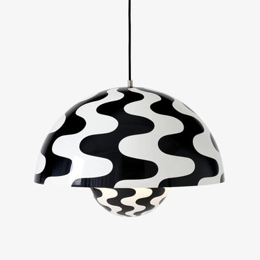 Multiple Flowerpot VP2 pendant lights installed in a commercial office space