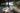 Vessel 2 Bluetooth LED Cordless Lamp by Smart & Green in white on a waterfront terrace table - LoftModern
