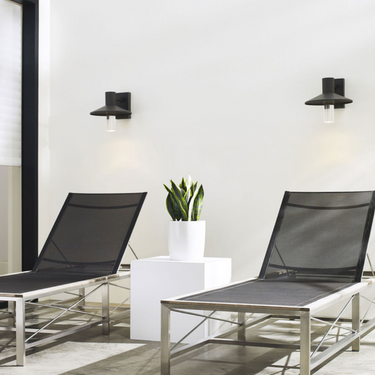 Visual Comfort Ash 8 (700OWASHH) outdoor sconce installed on a residential entryway with modern charcoal finish.