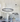 Visual Comfort Fiama 30-Inch Matte Black suspension fixture in luxury dining room