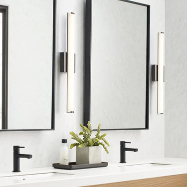 Visual Comfort Finn LED bathroom wall light in bronze with soft, wide-angle light diffusion